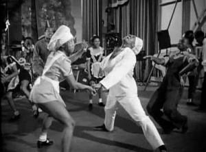 A scene from the movie version of this musical.